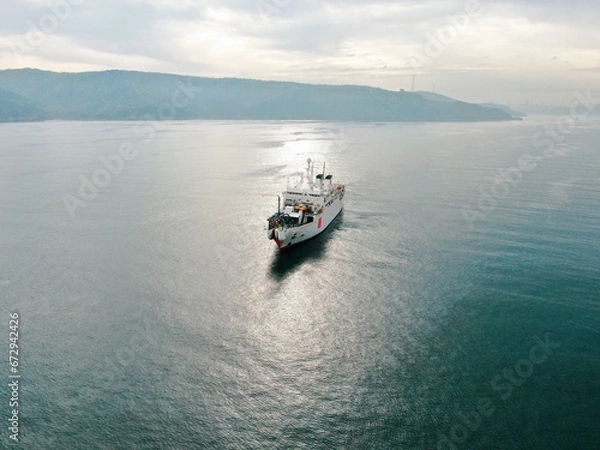 Fototapeta Aerial view of freight ship with cargo containers. 