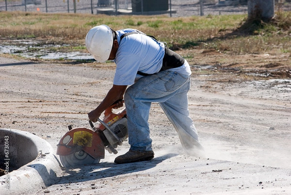 Obraz Man cutting concrete