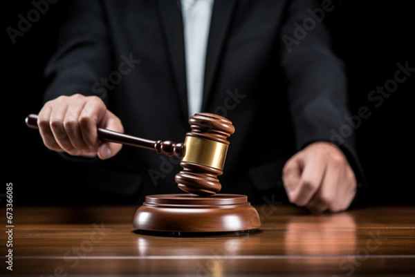 Fototapeta judge's gavel in the hands of the judge, close-up
