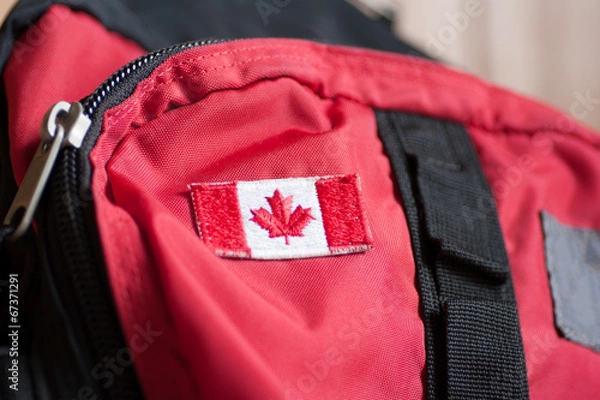 Obraz Canadian flag on backpack