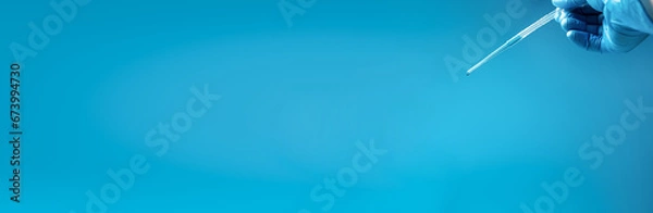 Fototapeta Pipette drip drops into laboratory test glass tubes, nobody.  Blue tone. Long banner.
