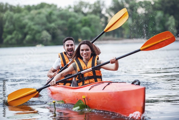 Obraz Couple travelling by kayak