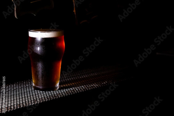 Obraz Beer pint close up black background