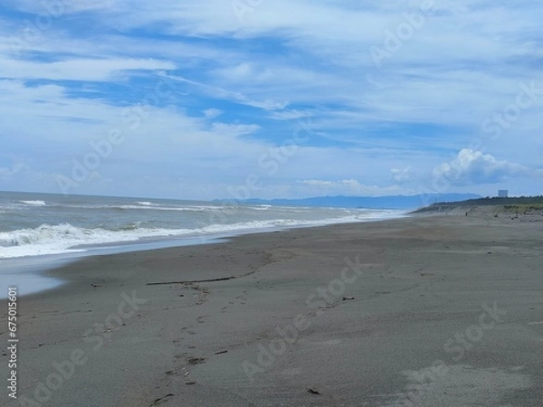 Obraz 台風で荒れた九州の海