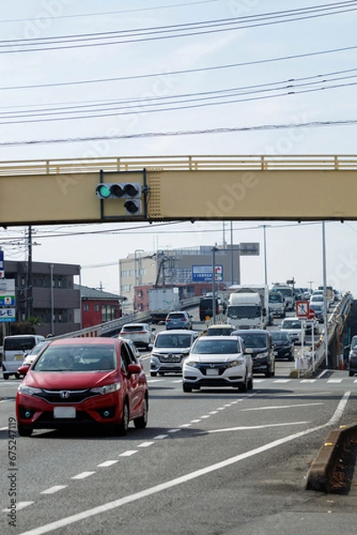 Fototapeta 国道を走る車
