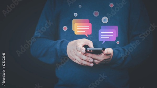 Fototapeta Social media application chat box. Young man using a smartphone with social media, typing live chat chatting on application communication digital website and social network concept.