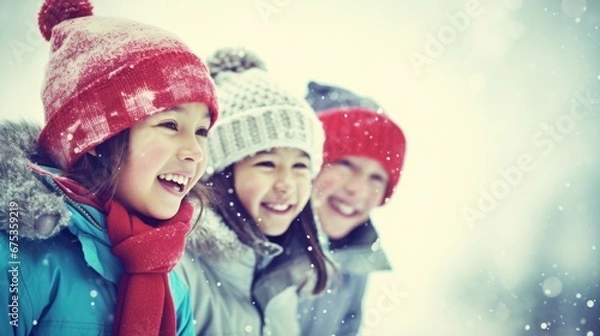 Fototapeta A group of children playing in the snow