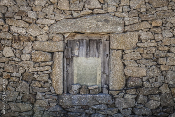 Fototapeta Door on an old stone wall