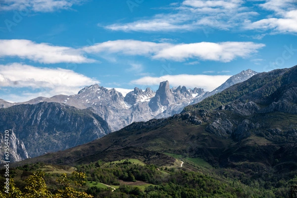 Fototapeta Panoramic view on Naranjo de Bulnes or Picu Urriellu, limestone peak dating from Paleozoic Era, located in Macizo Central region of Picos de Europa, mountain range in Asturias, North Spain