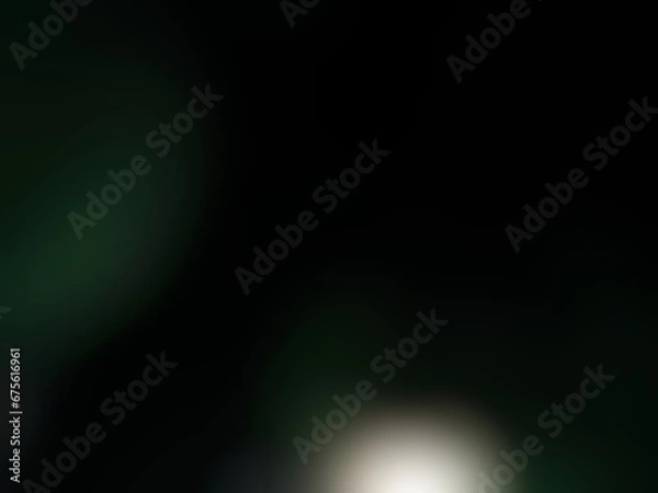 Fototapeta Abstract blurred background image of black color gradient used as an illustration. Designing posters or advertisements.