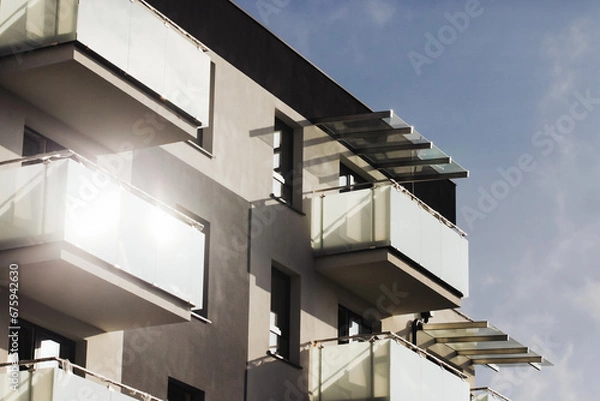 Obraz Luxurious apartments for sale. Bialystok city in Poland architecture background. High block of flats living area. New build neighborhood modern style. Real estate market in Europe. Sunset architecture