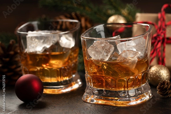 Fototapeta Two glasses of whiskey with ice