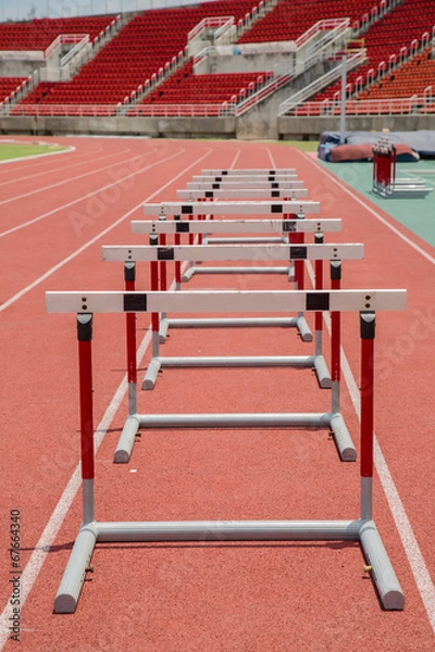 Fototapeta Hurdles on running track
