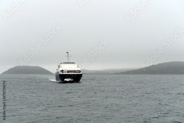 Fototapeta Catamaran "Moscow" at the ferry crossing in Peter the Great Bay. Popov Island, Vladivostok