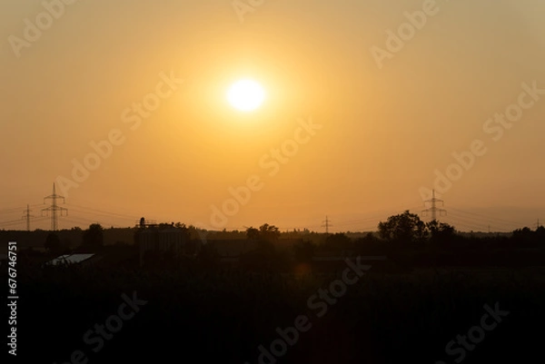 Fototapeta sunset over the river