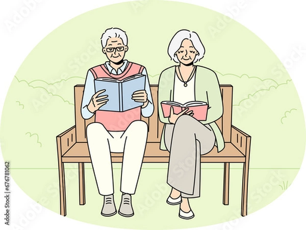 Fototapeta Mature couple on bench reading books