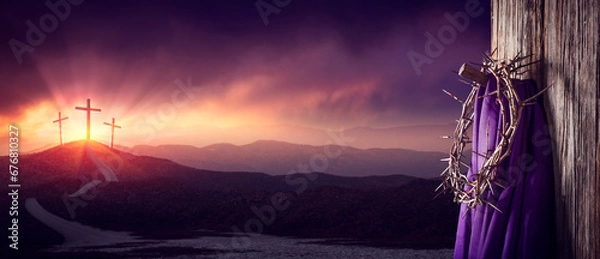 Obraz Crown Of Thorns And Purple Robe Hanging On Door Post At Sunrise With Three Crosses In The Distance - Crucifixion And Resurrection Of Jesus Christ Concept
