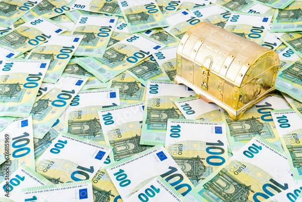 Obraz Right hand view on closed golden treasure chest on euro money bills, Pandora box concept of financial hazards