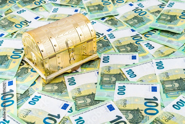 Obraz Golden chest on many 100 euro banknotes as background, Pandora chest concept of financial hazards