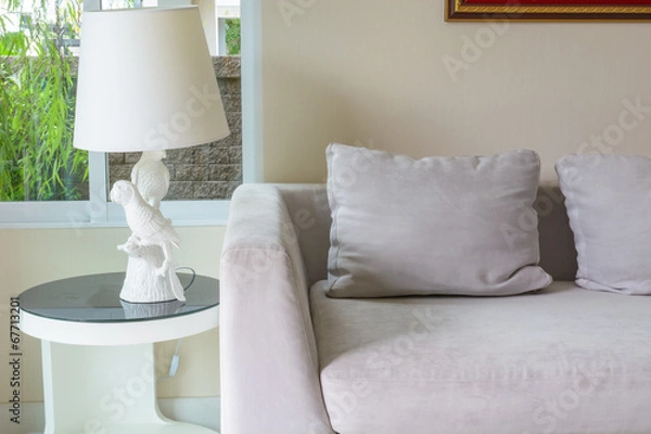 Fototapeta Interior design with sofa and lamp on end table