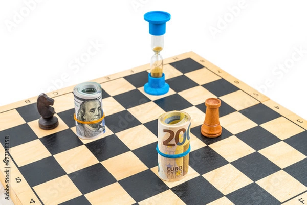 Fototapeta Top angle view on chess board with selected chess figures and rolled euro bank notes and American dollar bills. Concept of business strategy, leadership, stock market and competition.