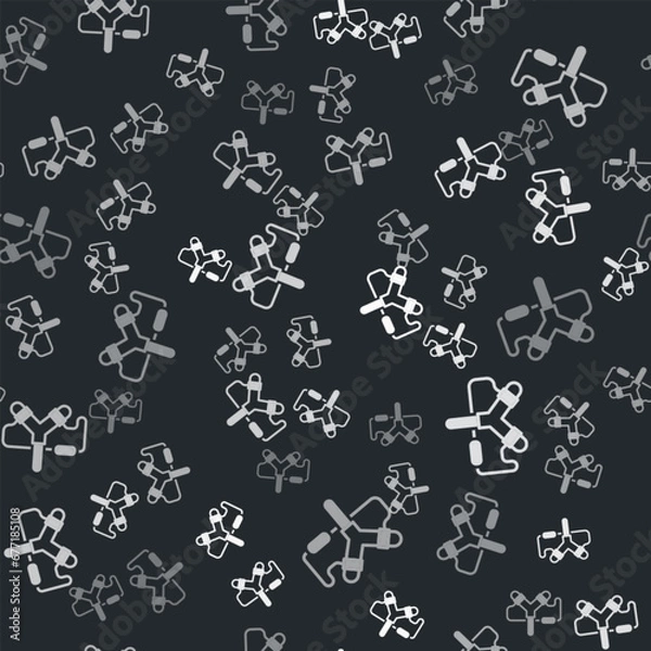 Fototapeta Grey Slingshot icon isolated seamless pattern on black background. Vector