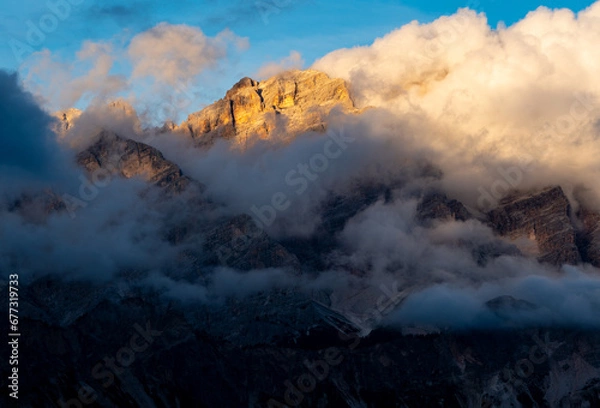 Obraz Mountain Sunset Through The Clouds