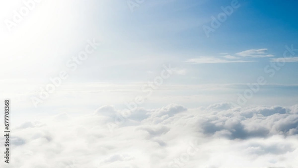 Fototapeta High nature view large soft white clouds on soft sky background in the morning, Panorama sunlight with white clouds and clear sky, View of white cloudy on the plane.
