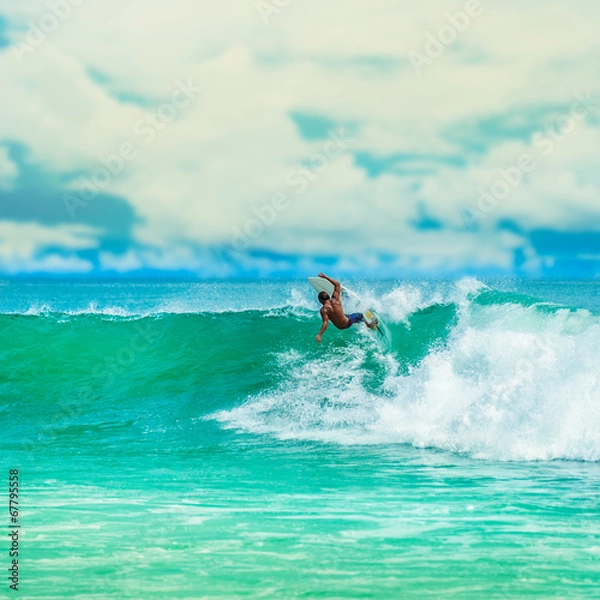 Obraz Athletic surfer with board