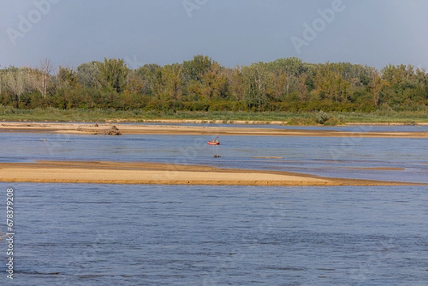 Fototapeta Człowiek w kajaku płynie rzeką