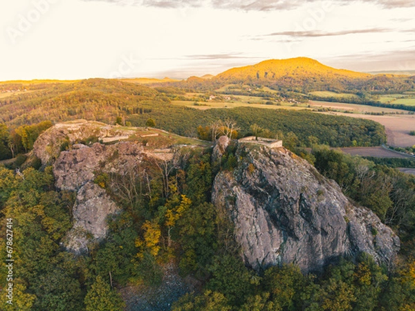 Fototapeta Kalich (Kelchberg in German) is a castle ruin above the village of Trebusin. The castle was founded by the Hussite governor Jan Zizka in 1421.