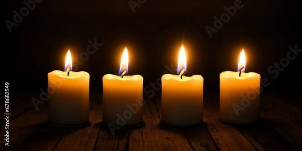 Fototapeta Group of candles in the dark, beautiful candle background.