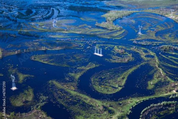 Fototapeta Aerial view flooded area with power lines