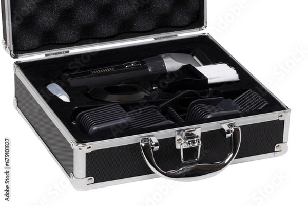 Obraz Closeup of a opened small black silver equipment case or suitcase with professional hairdresser's set isolated on a white background.