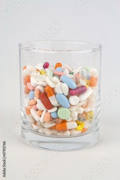 Fototapeta Glas voller Tabletten
