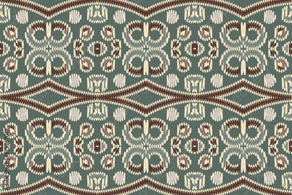 Fototapeta African Ikat paisley seamless pattern.geometric ethnic oriental pattern traditional on green background.Aztec style abstract vector illustration.design texture,fabric,clothing,wrapping,carpet,print