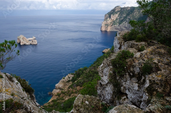 Fototapeta Beautiful sights in Ibiza Spain of the rugged coast, Mediterranean sea and charming architecture 