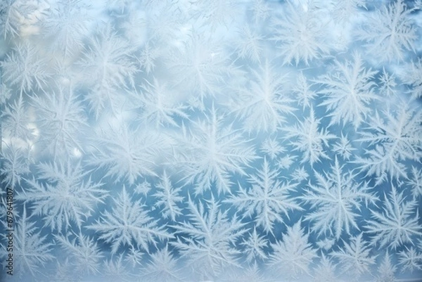 Fototapeta snow patterns formed on a window