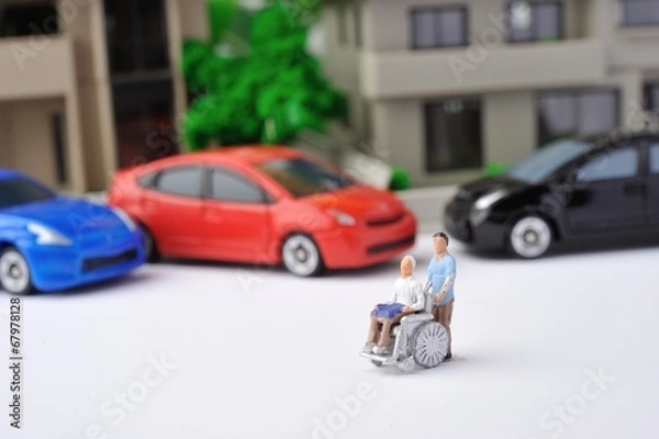 Obraz 車椅子の介護と交通弱者