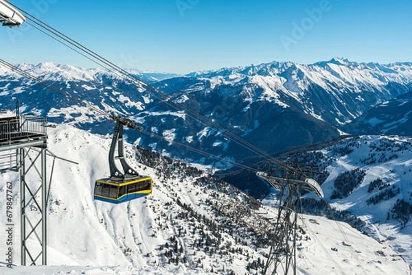 Fototapeta End station of an overhead cable car (160er Tux) with a panorama of European Alps in the background, Mayrhofen, Zillertal valley, Austria