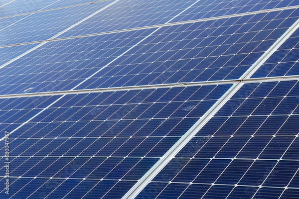 Fototapeta Photovoltaic solar power panel. Green clean alternative power energy concept. Electric power from sun.
