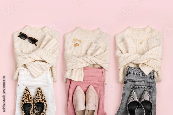 Fototapeta Three sets of clothes. Capsule wardrobe. Fashion Look. Jumpers with jeans and shoes. Fashion spring, autumn or winter outfit.  Women's stylish and elegant clothes. Flat lay, top view, overhead..