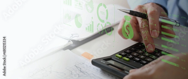 Obraz Business accounting concept, Business man using calculator with computer laptop, budget and loan paper in office.