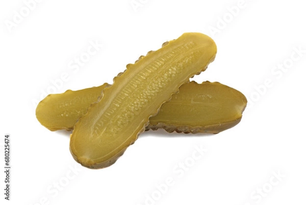 Fototapeta One pickled cucumber cut in half on white background