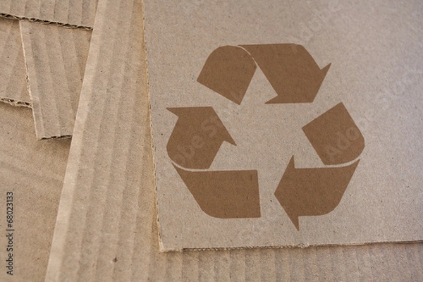 Fototapeta Cardboard with recycle symbol