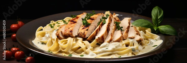 Obraz Chicken Alfredo, Tagliatelle with greens and cream sauce on a dark background, Fettuccine meal. created with Generative AI
