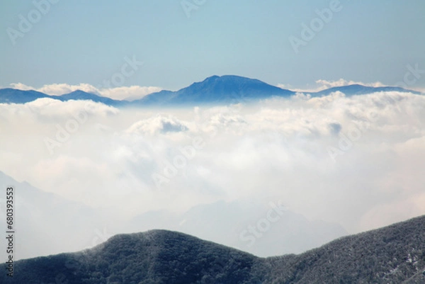 Fototapeta mountain peak and fog