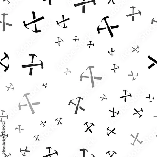 Obraz Seamless vector pattern with crossed hammers symbols, creating a creative monochrome background with rotated elements. Illustration on transparent background