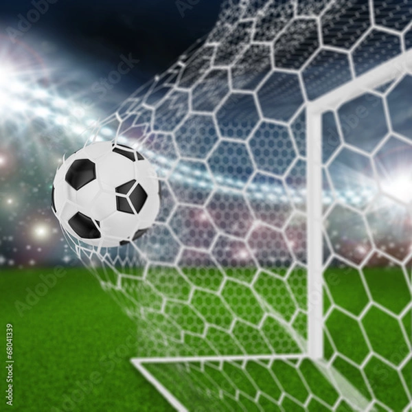 Fototapeta soccer ball in goal net