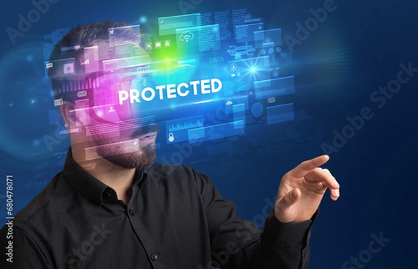 Fototapeta Businessman looking through Virtual Reality glasses